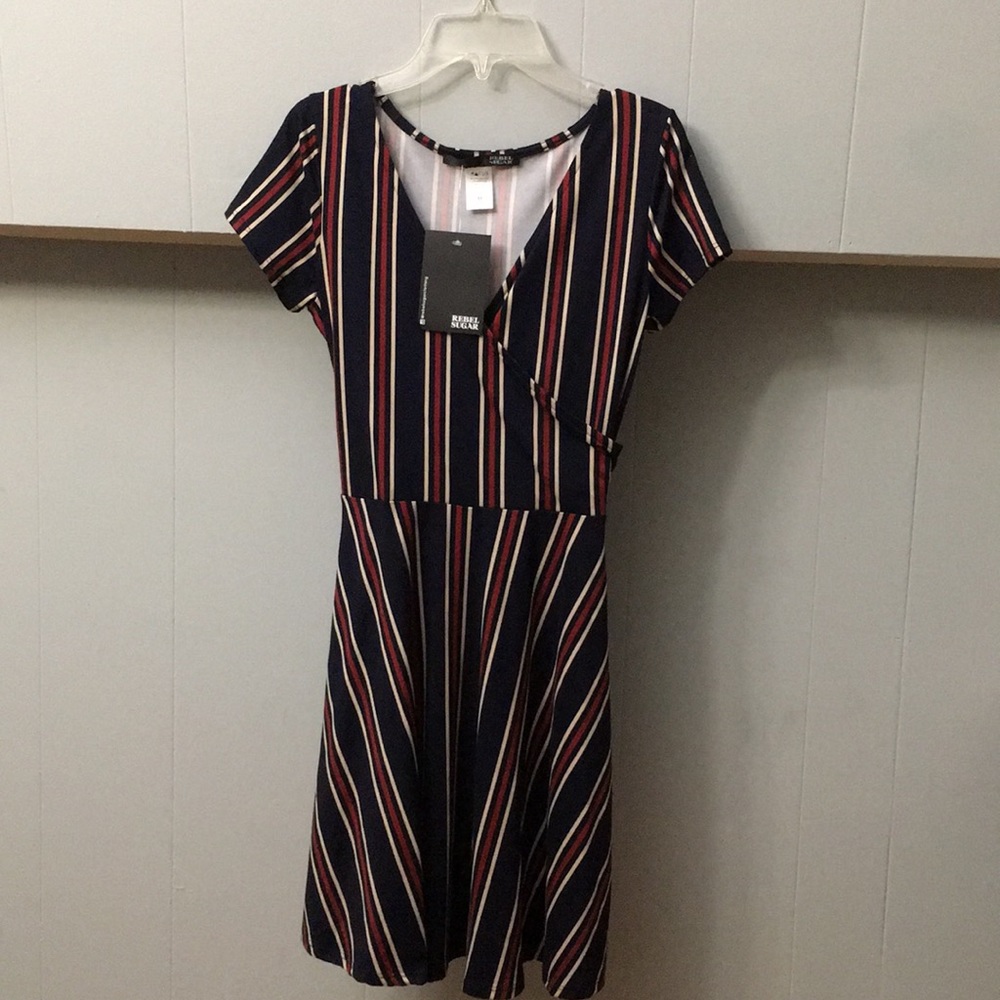 never worn, multi colored dress.